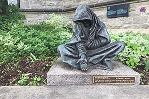 Statue in front of a church in Ottawa